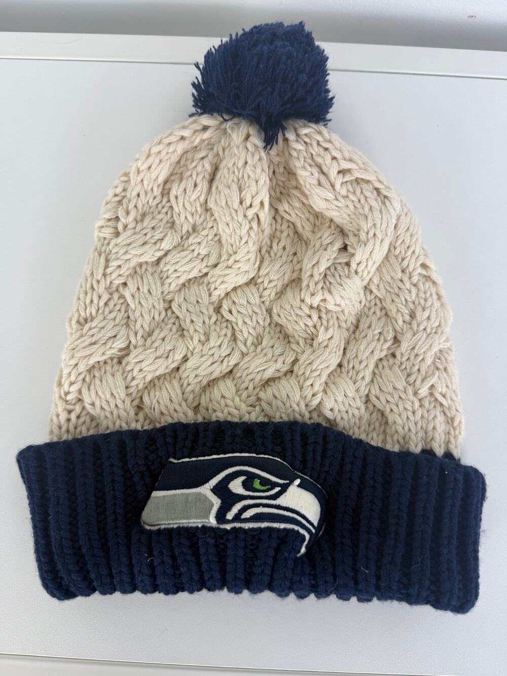 NFL Team Apparel Seattle Seahawks Womens Cable Chunky Knit Pom Cream/Blue Beanie